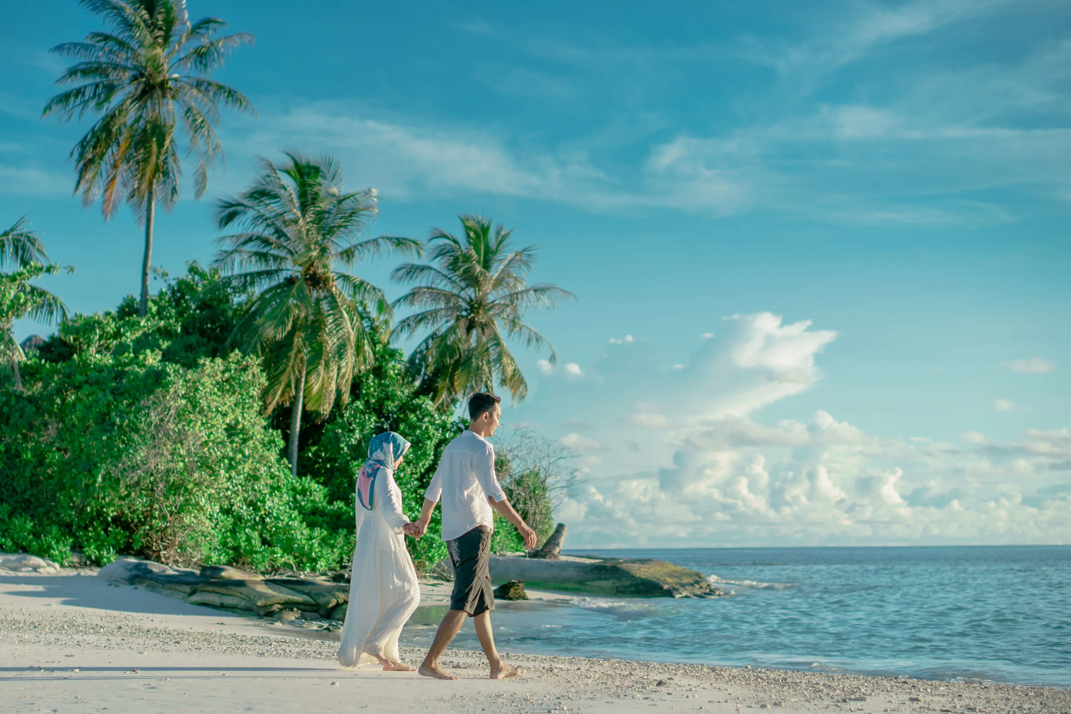 Malaysian Couple at Bali Honeymoon Resort with Clifftop Ocean View